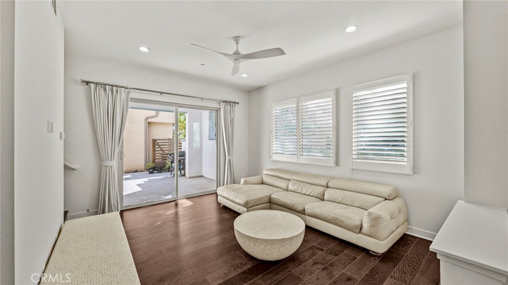 113 Carmine Irvine, CA 92618 - Photo 6 of 43 a living room with furniture and a large window