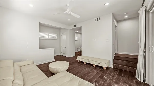 a bathroom with a toilet sink and shower