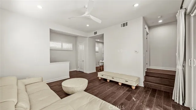 a bathroom with a toilet sink and shower