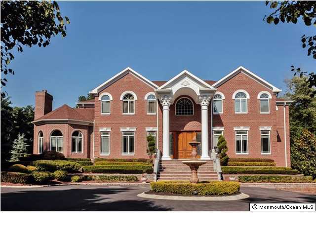 34 Line Road Holmdel, NJ 07733 - Photo 2 of 25 a front view of a house with a porch