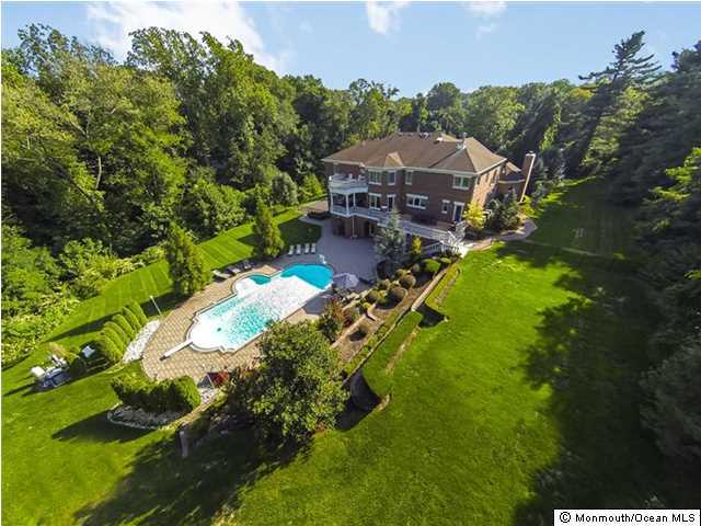 34 Line Road Holmdel, NJ 07733 - Photo 22 of 25 an aerial view of a house with a garden