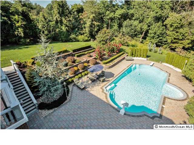 34 Line Road Holmdel, NJ 07733 - Photo 25 of 25 a view of a yard with an outdoor space