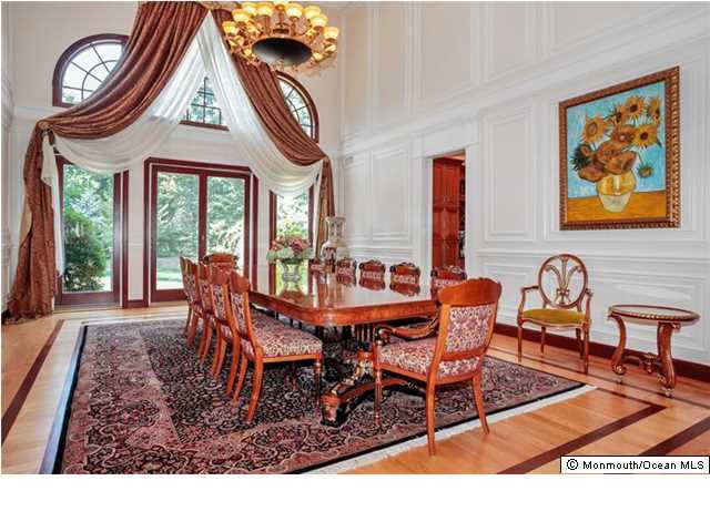 34 Line Road Holmdel, NJ 07733 - Photo 5 of 25 a dining room with furniture a rug and a large window