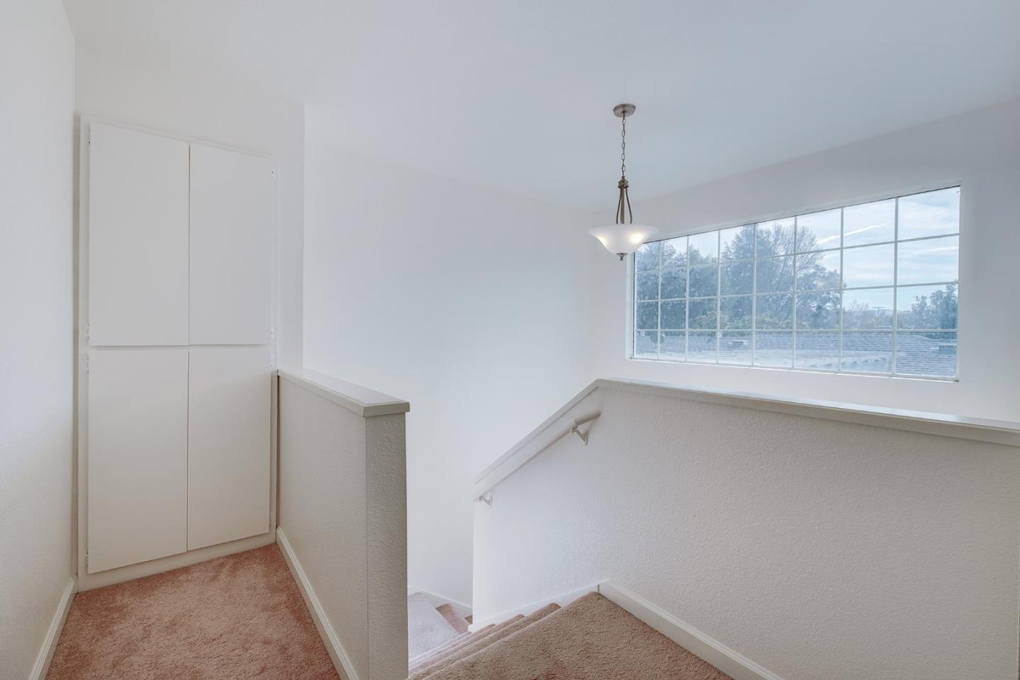 1013 Woodside Road Redwood City, CA 94061 - Photo 11 of 20 a view of hallway with window and entryway