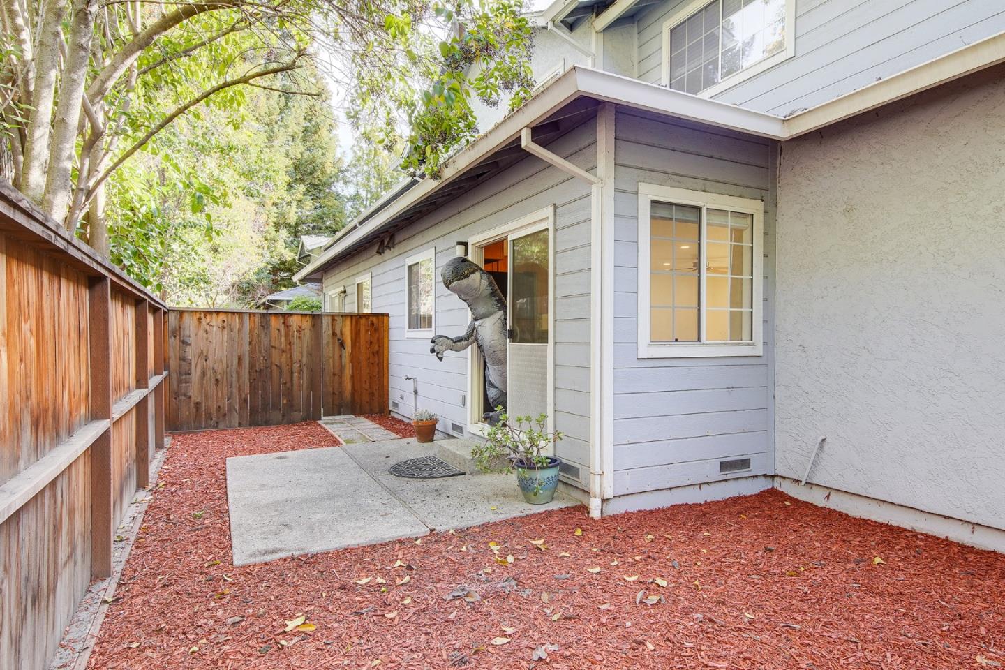 1013 Woodside Road Redwood City, CA 94061 - Photo 9 of 20 a view of a house with a yard