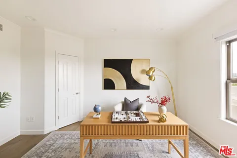 a living room with furniture and rug