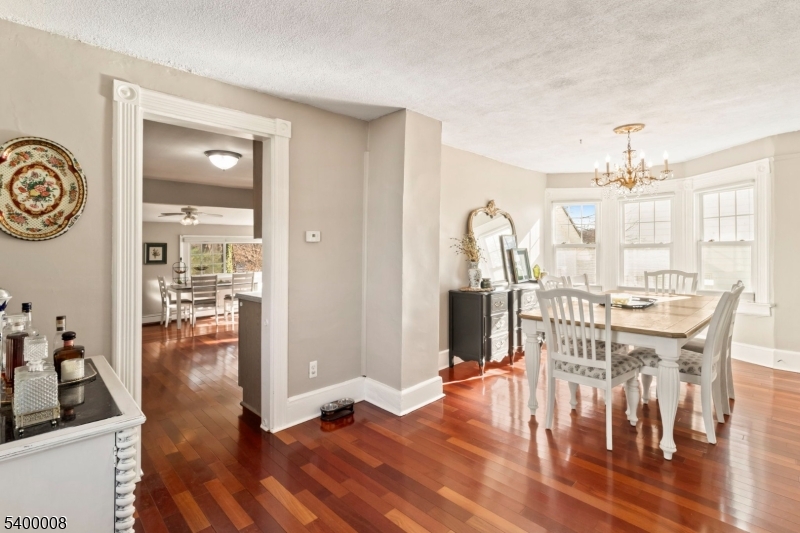 22 Mott Place Rockaway, NJ 07866 - Photo 11 of 42 a view of a dining room with furniture window and wooden floor