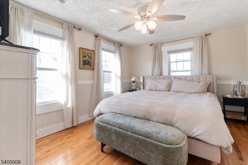 22 Mott Place Rockaway, NJ 07866 - Photo 25 of 42 a bedroom with a bed furniture and a window
