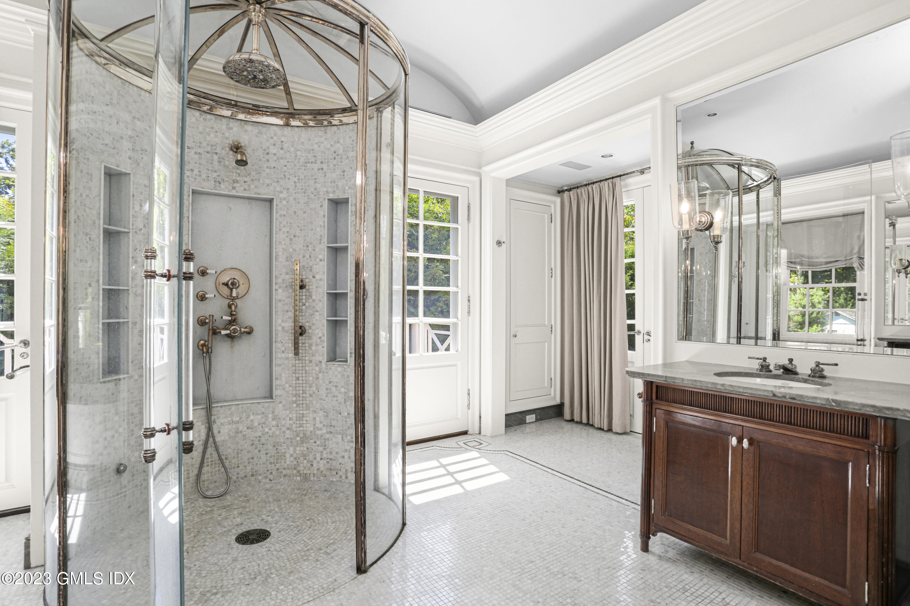 26 Memory Lane Greenwich, CT 06831 - Photo 15 of 43 a bathroom with a granite countertop sink mirror and shower