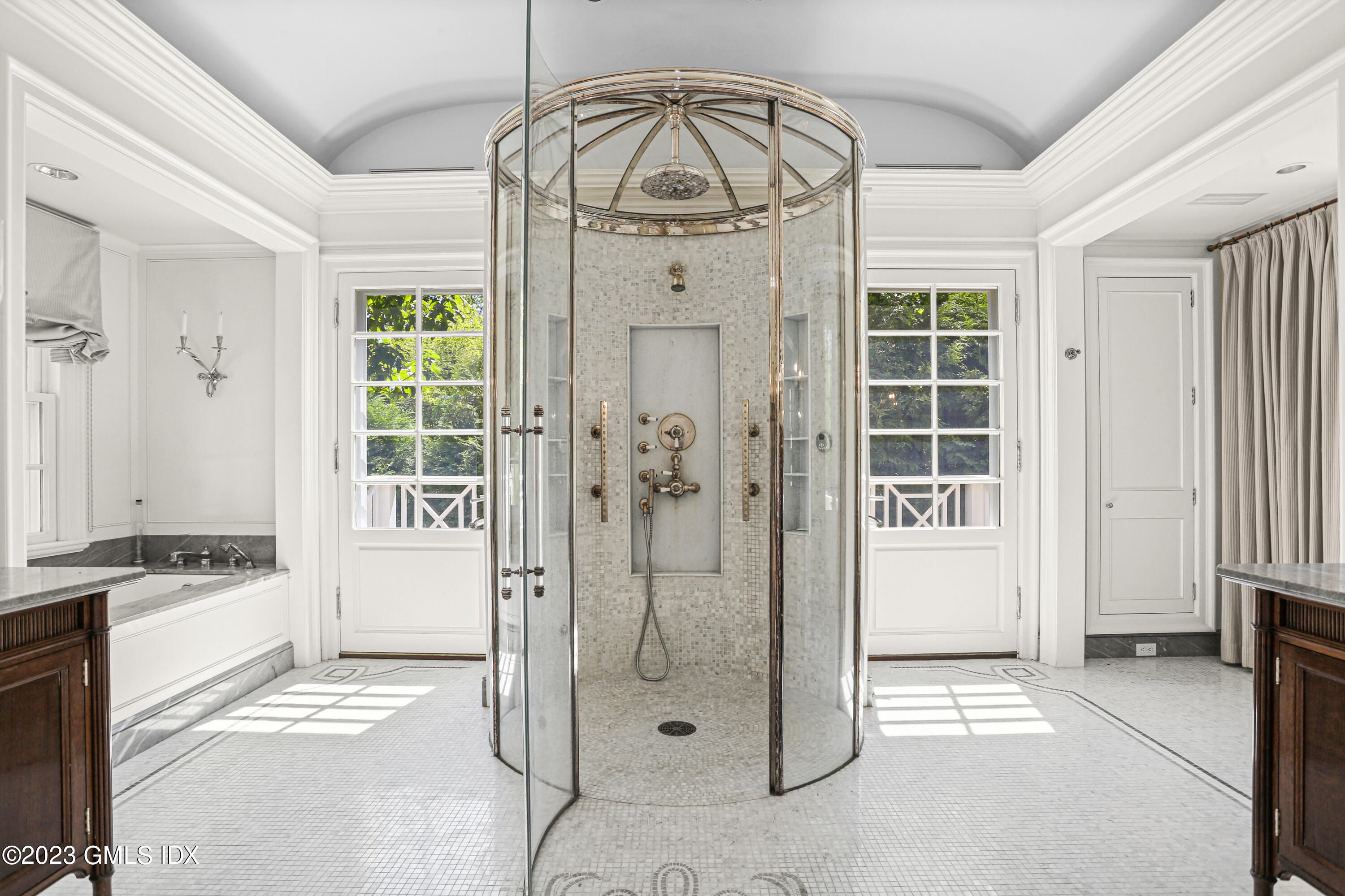 26 Memory Lane Greenwich, CT 06831 - Photo 16 of 43 a bathroom with a granite countertop sink a mirror and shower