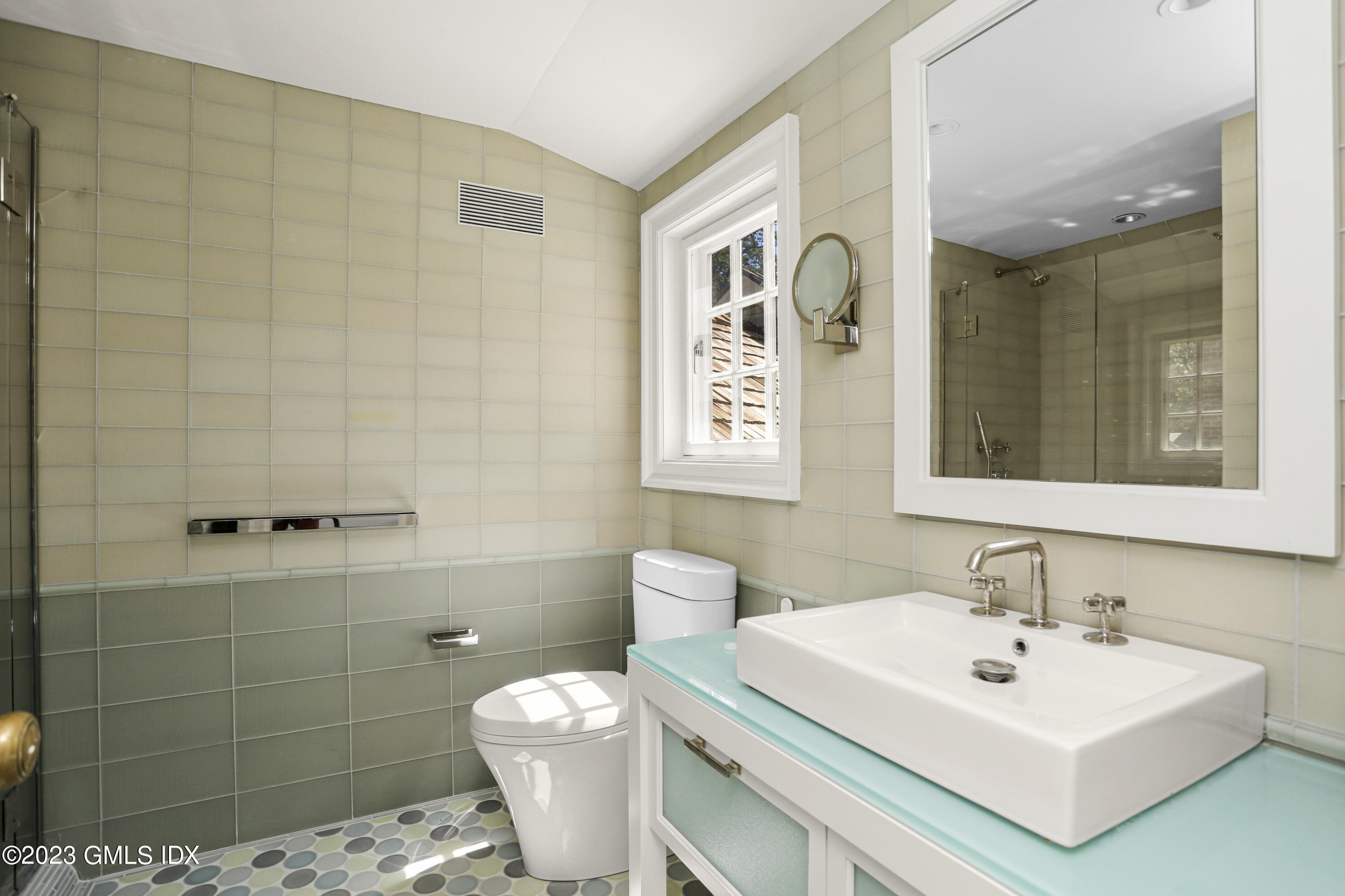 26 Memory Lane Greenwich, CT 06831 - Photo 18 of 43 a bathroom with a sink mirror and toilet