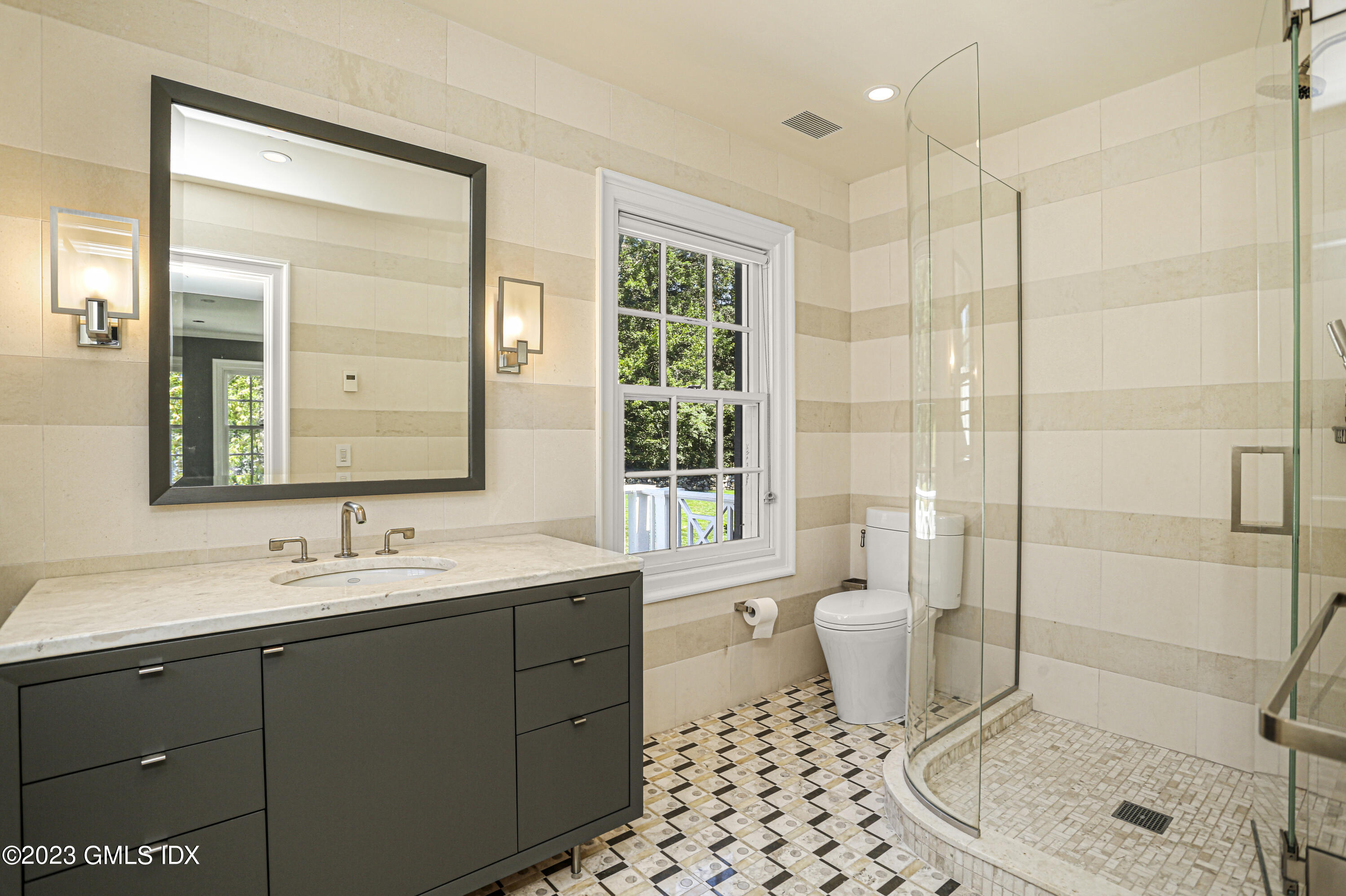 26 Memory Lane Greenwich, CT 06831 - Photo 20 of 43 a bathroom with a sink toilet and shower