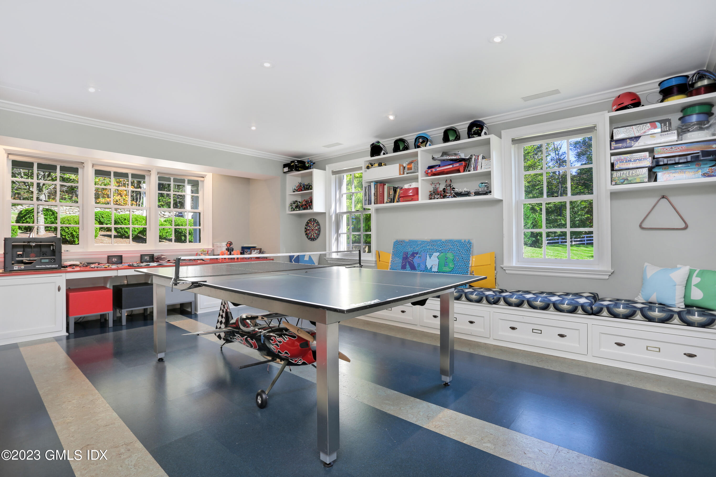 26 Memory Lane Greenwich, CT 06831 - Photo 23 of 43 a room with lots of furniture and a window