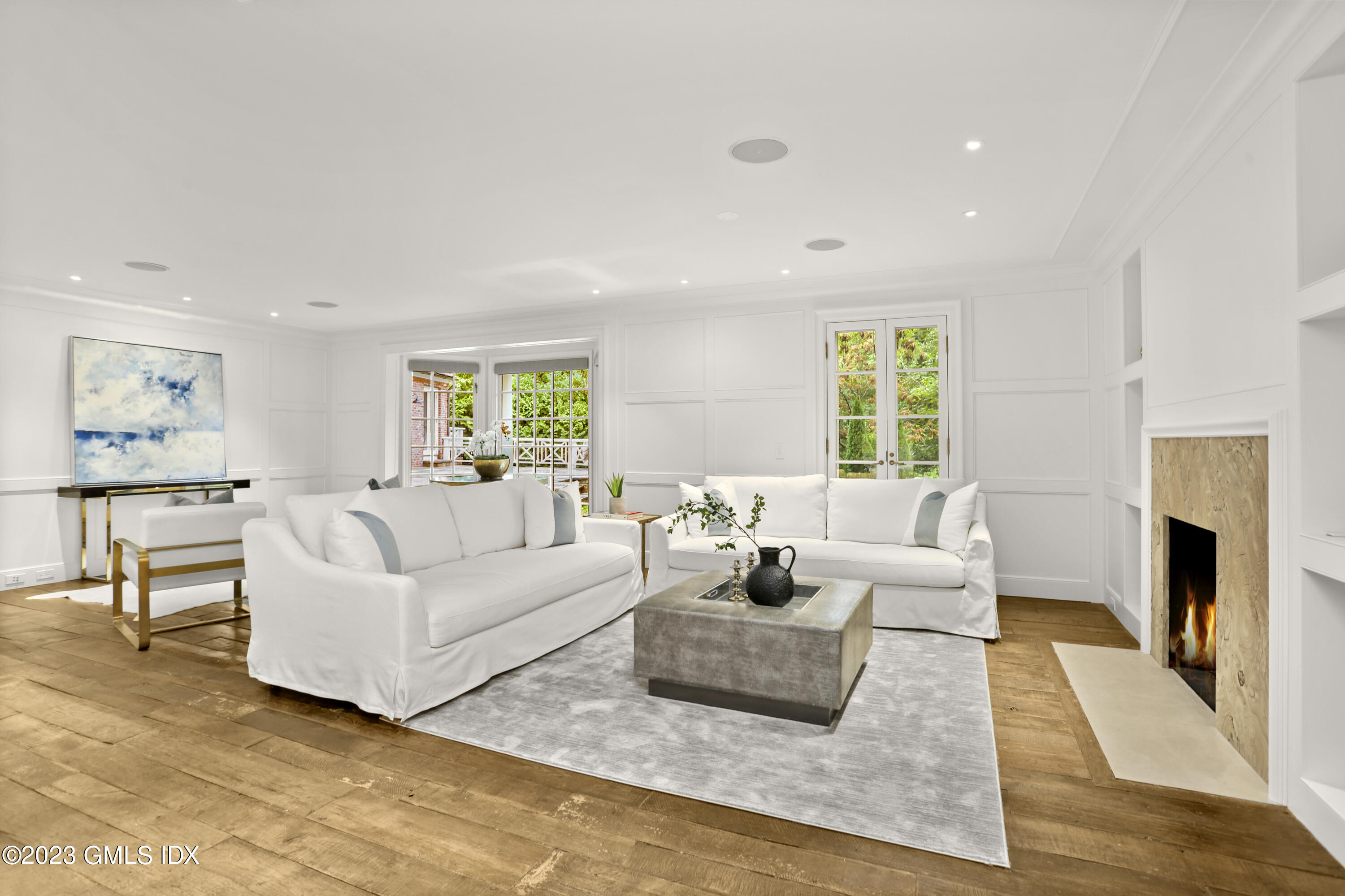 26 Memory Lane Greenwich, CT 06831 - Photo 4 of 43 a living room with furniture and a fireplace