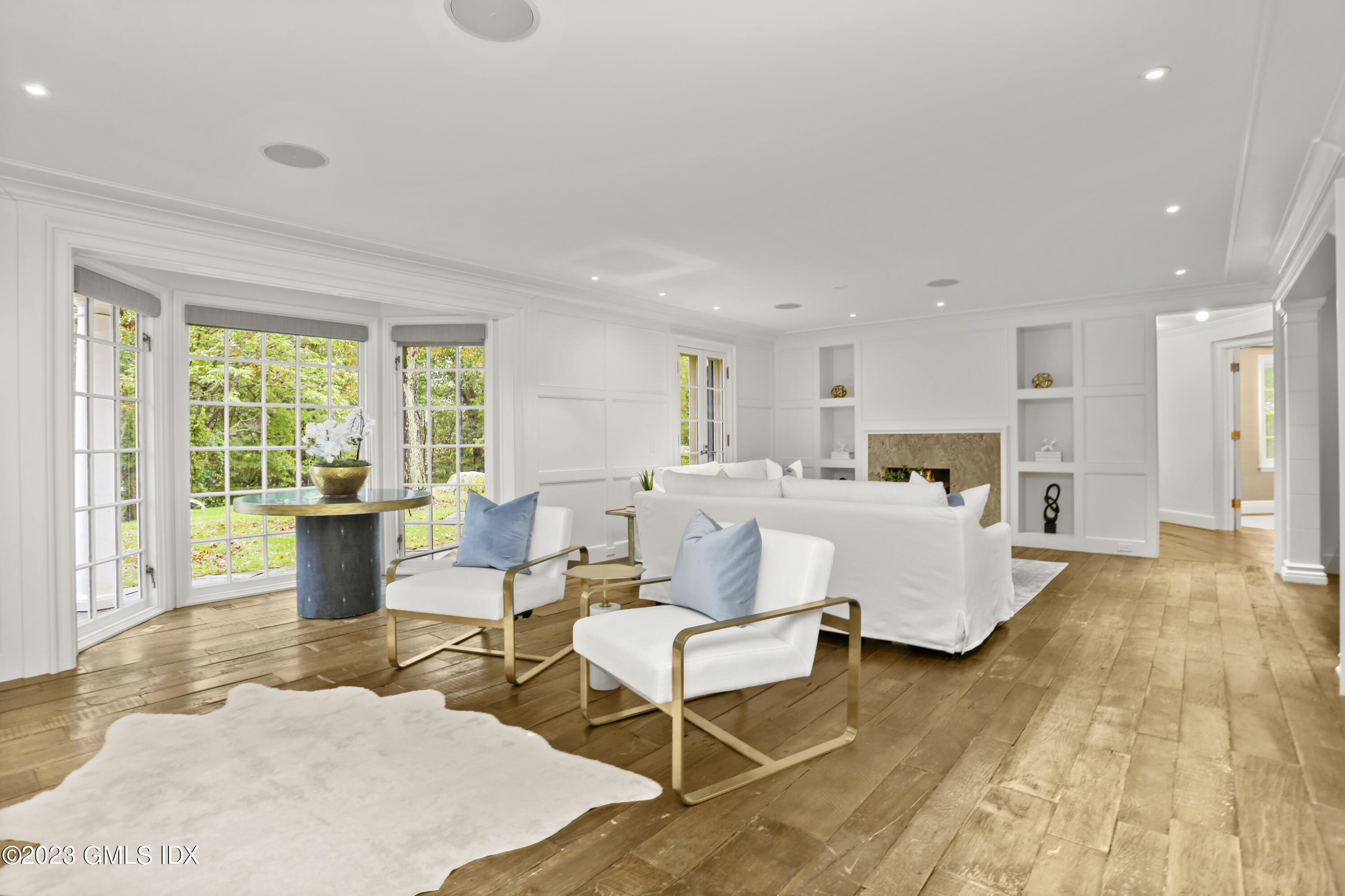 26 Memory Lane Greenwich, CT 06831 - Photo 5 of 43 a living room with furniture and large windows