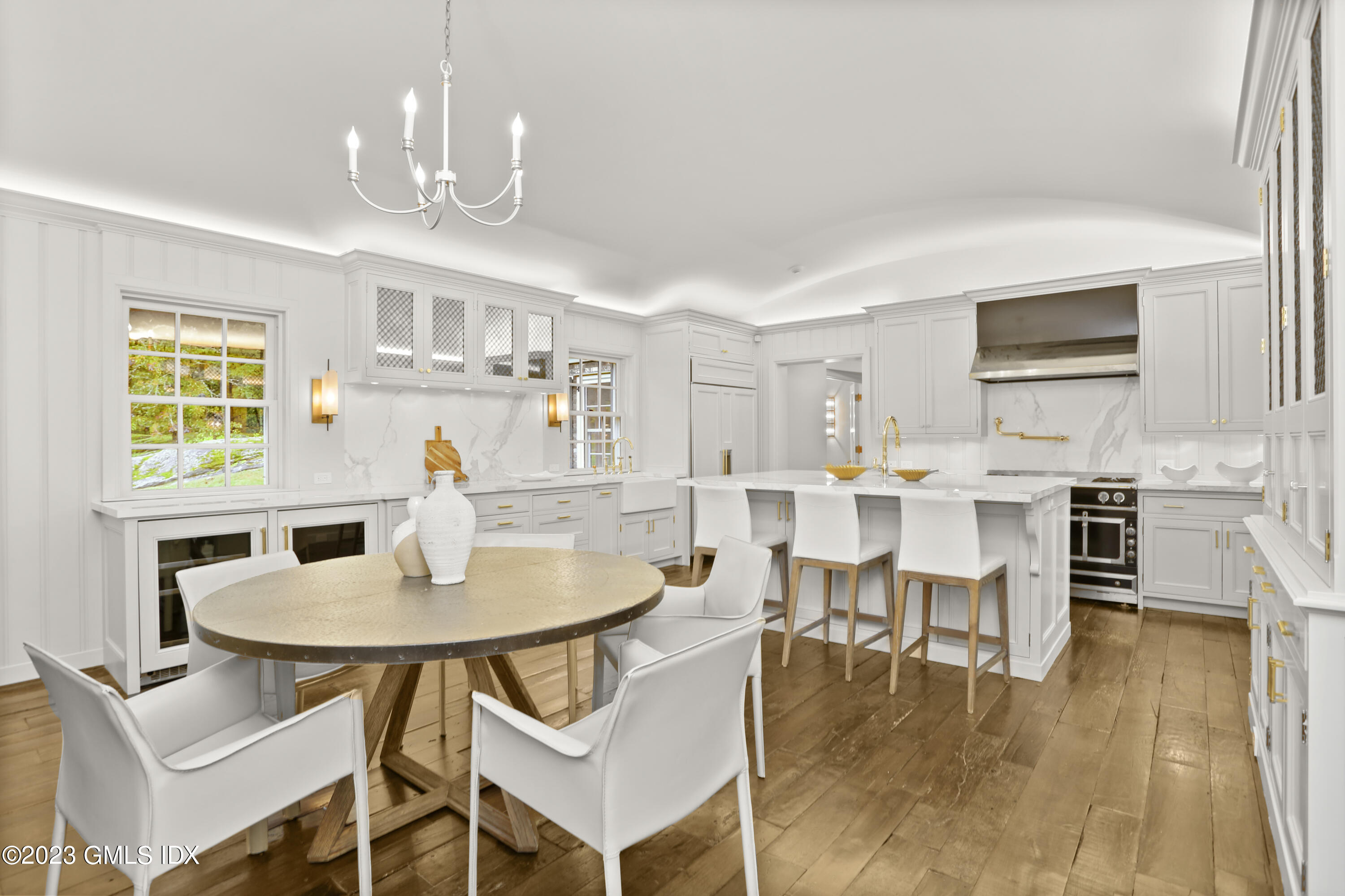 26 Memory Lane Greenwich, CT 06831 - Photo 7 of 43 a dining room with wooden floor and breakfast area