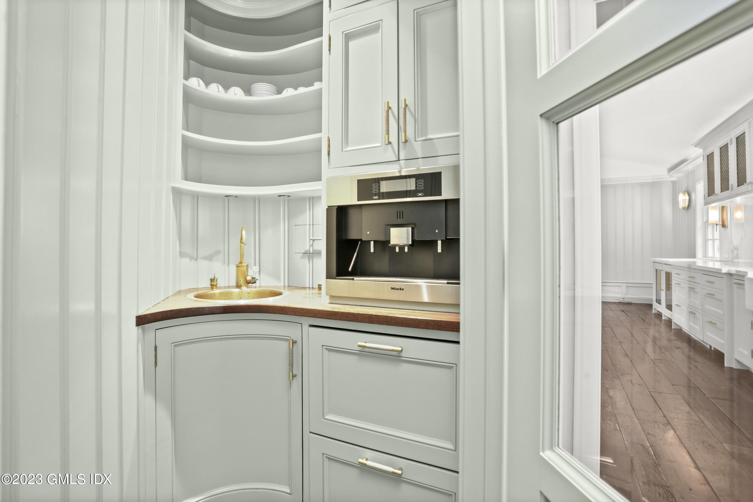 26 Memory Lane Greenwich, CT 06831 - Photo 9 of 43 a view of cabinets a sink and a window in a room