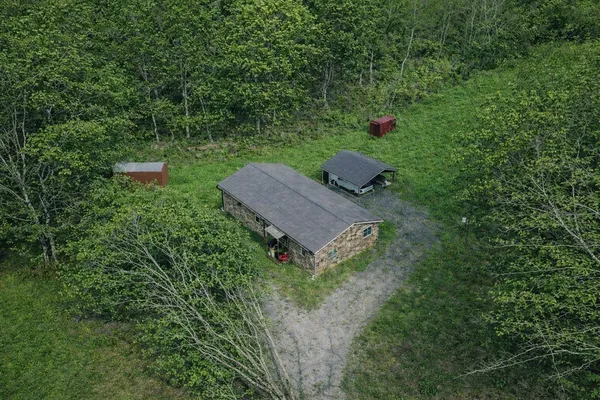 a view of backyard with green space
