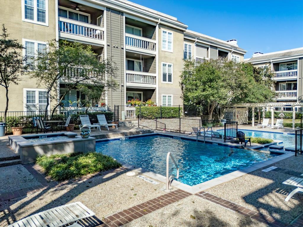 5310 Keller Springs Road, Unit 332 Dallas, TX 75248 - Photo 31 of 39 Community pool with a patio
