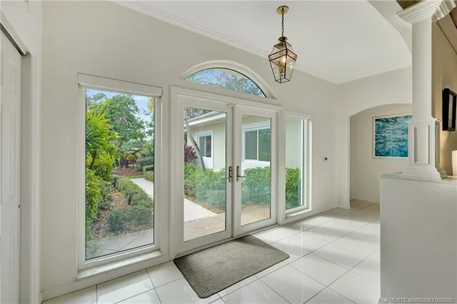 a view of an entryway with wooden floor