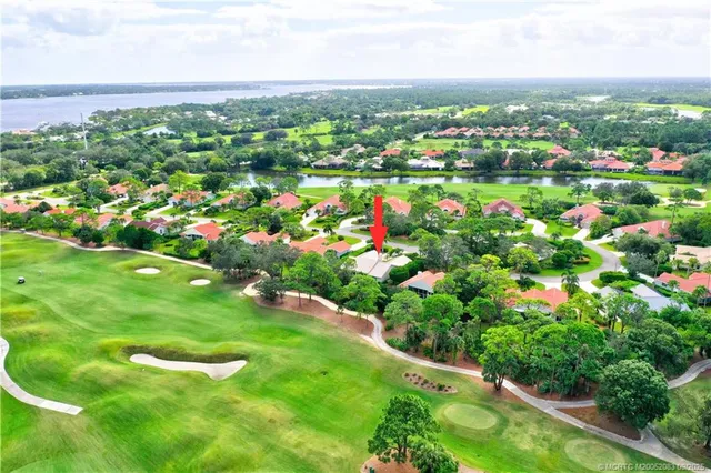 a view of a lake with a building in front of it