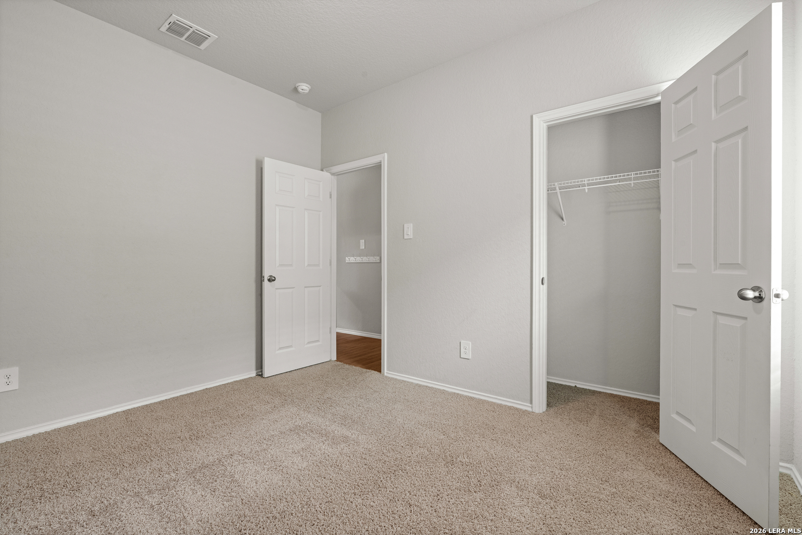 14606 Hackamore Way Elmendorf, TX 78112 - Photo 13 of 18 a view of an empty room