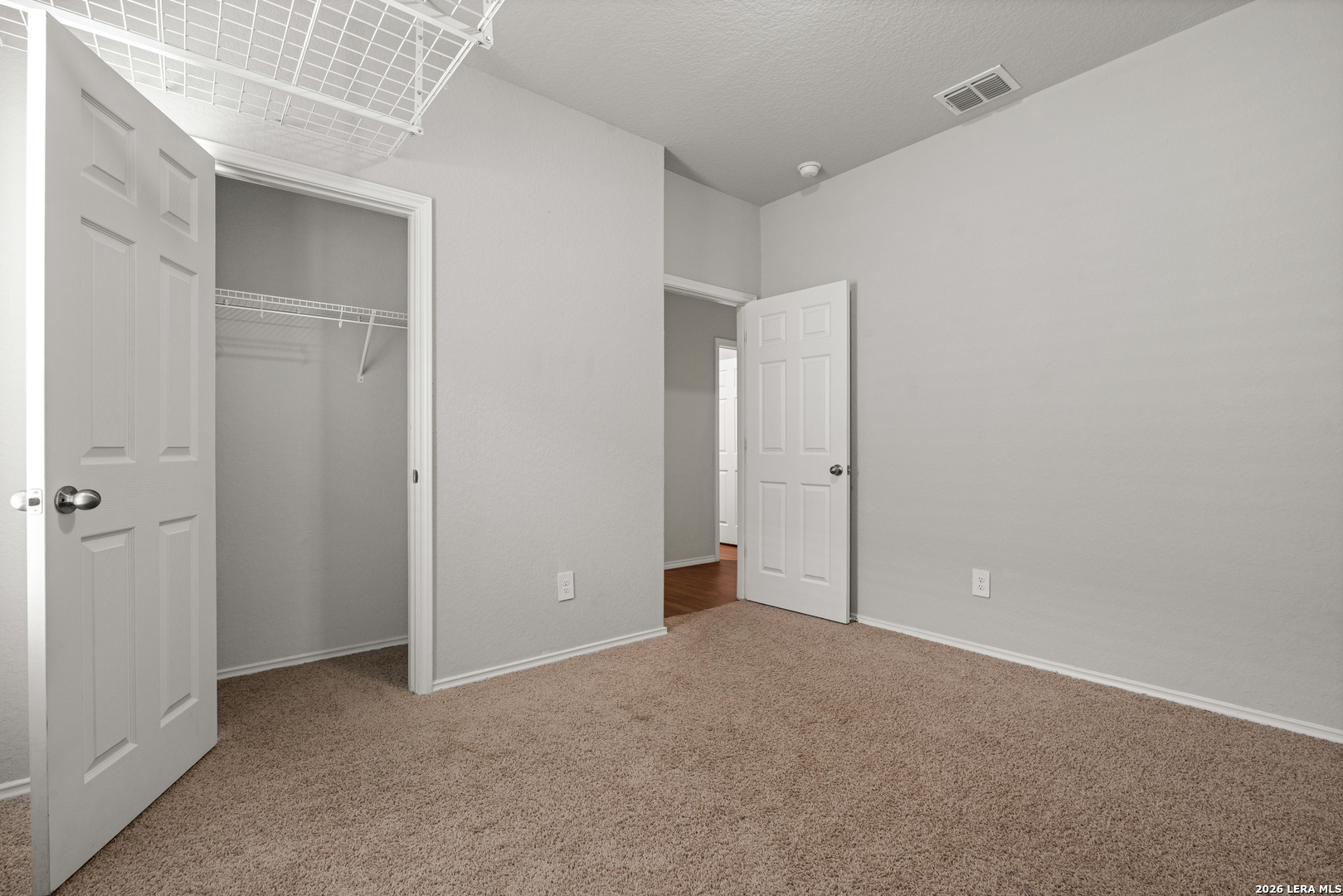 14606 Hackamore Way Elmendorf, TX 78112 - Photo 16 of 18 an empty room with closet area