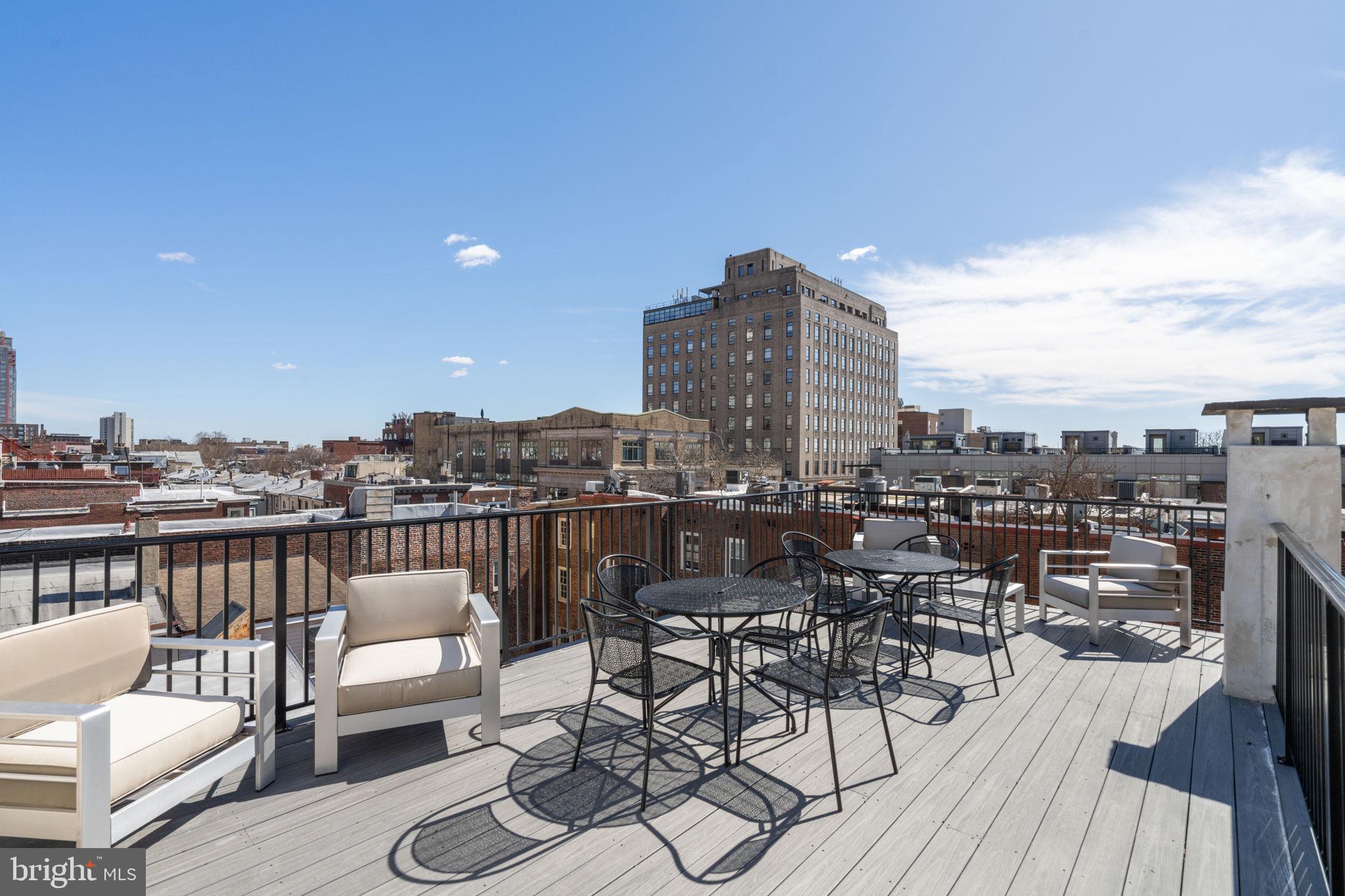 1908 Pine Street, Unit 6 Philadelphia, PA 19103 - Photo 14 of 24 a view of a roof deck with furniture