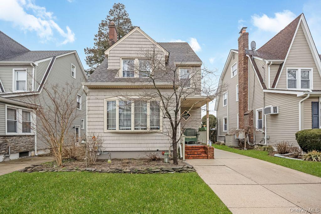315 Marcellus Road Mineola, NY 11501 - Photo 1 of 18 a view of house with yard
