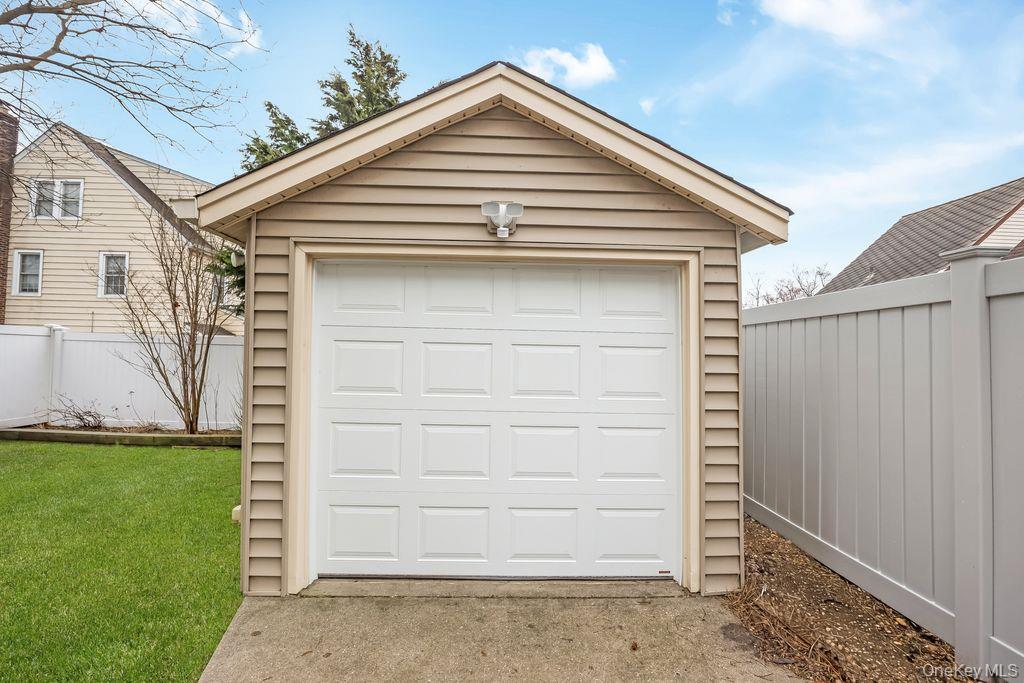 315 Marcellus Road Mineola, NY 11501 - Photo 16 of 18 a view of house with a outdoor space