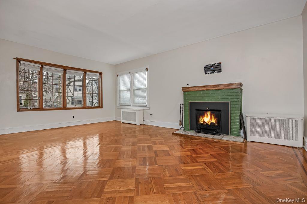 315 Marcellus Road Mineola, NY 11501 - Photo 4 of 18 a view of empty room with a fireplace