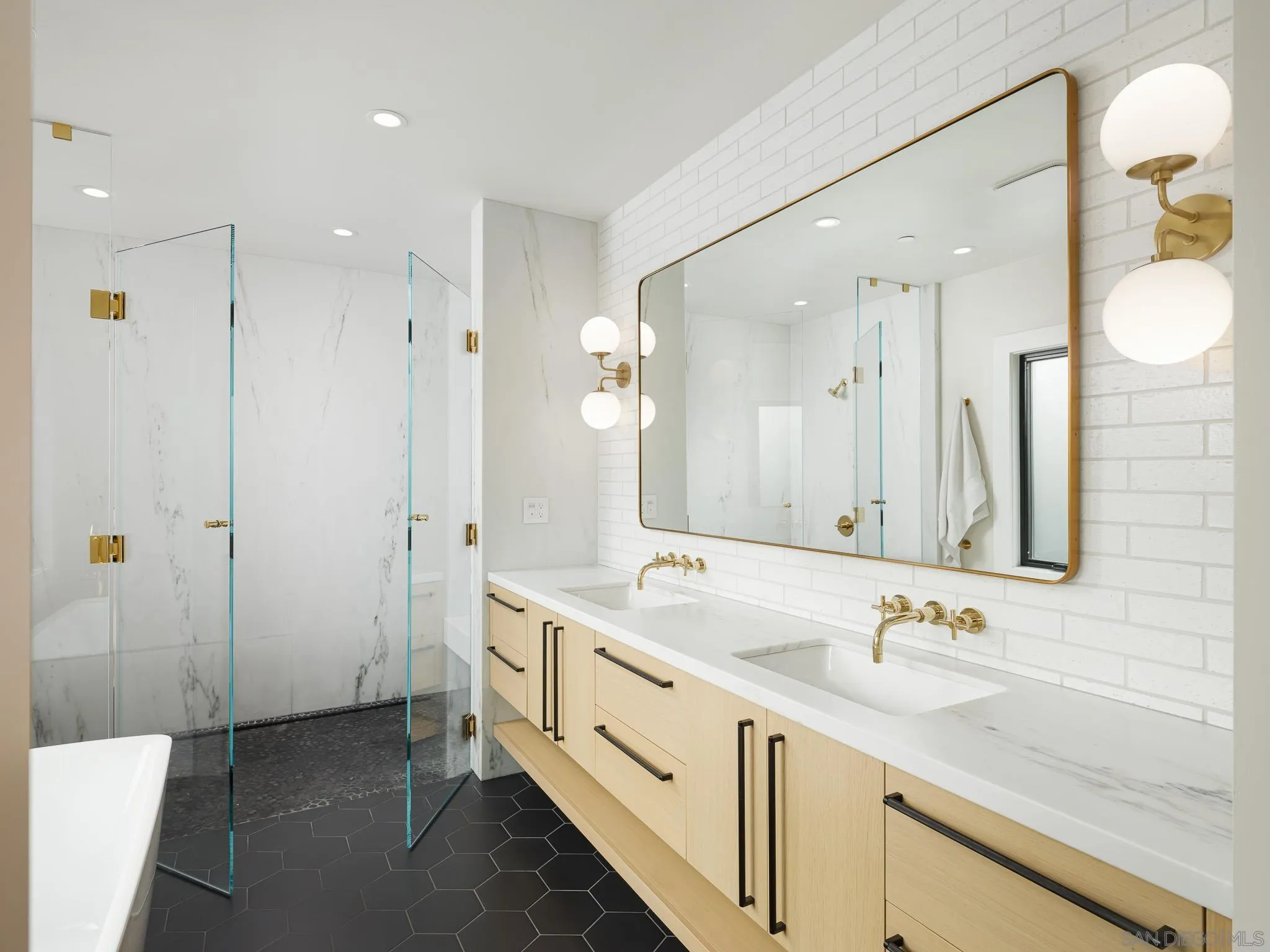 631 Stratford Drive Encinitas, CA 92024 - Photo 22 of 52 a bathroom with a double vanity sink mirror and double