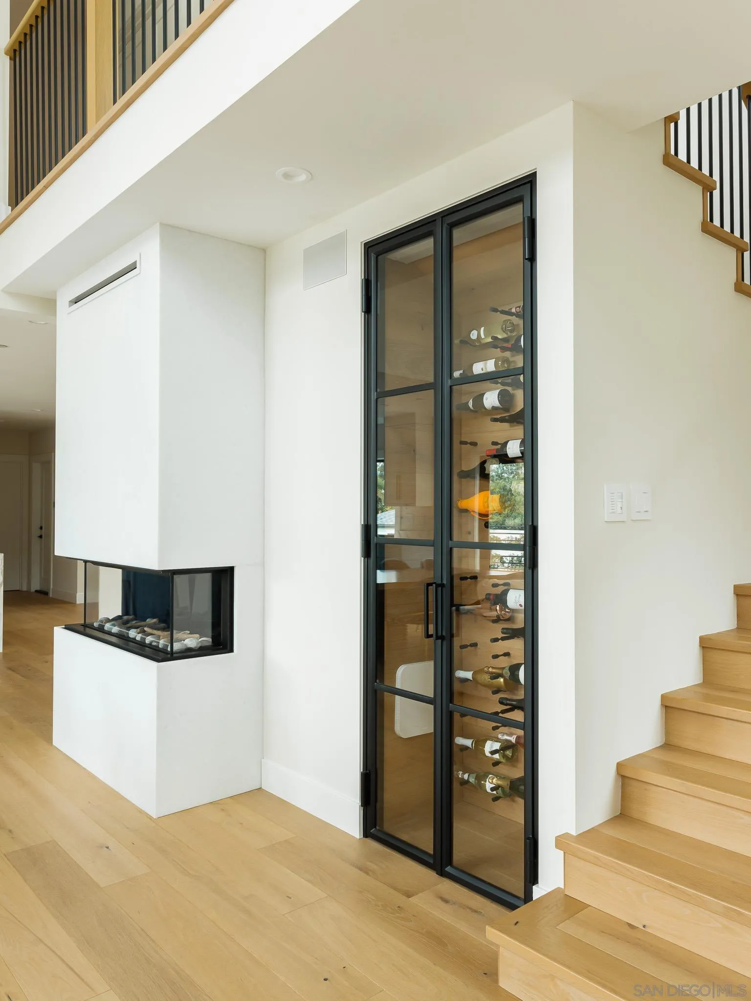 631 Stratford Drive Encinitas, CA 92024 - Photo 9 of 52 a view of an entryway with wooden floor and cabinet