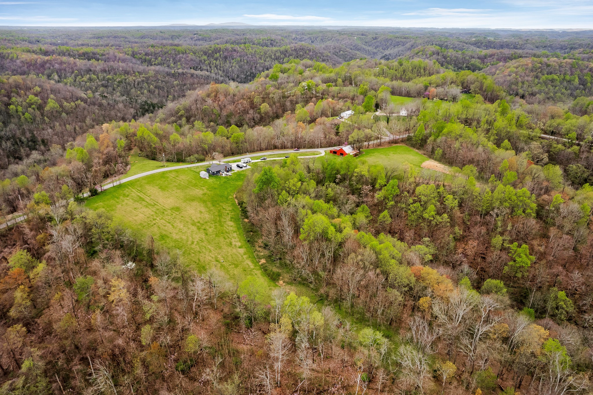 12245 Hopewell Road Silver Point, TN 38582 - Photo 56 of 56 an aerial view of residential houses with outdoor space and trees