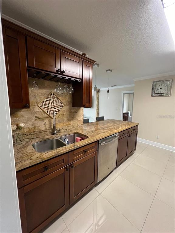 5602 Joyner Road Tampa, FL 33624 - Photo 19 of 28 a bathroom with a sink and a mirror