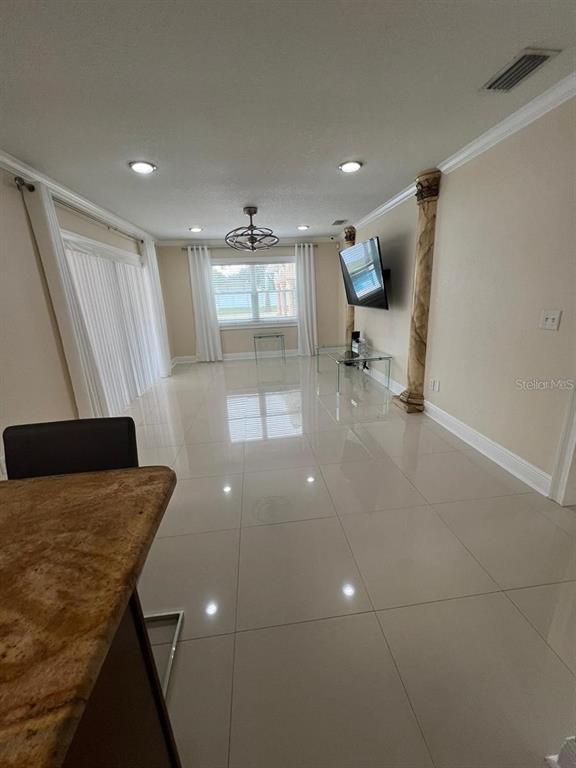 5602 Joyner Road Tampa, FL 33624 - Photo 23 of 28 a bathroom with a sink and mirror