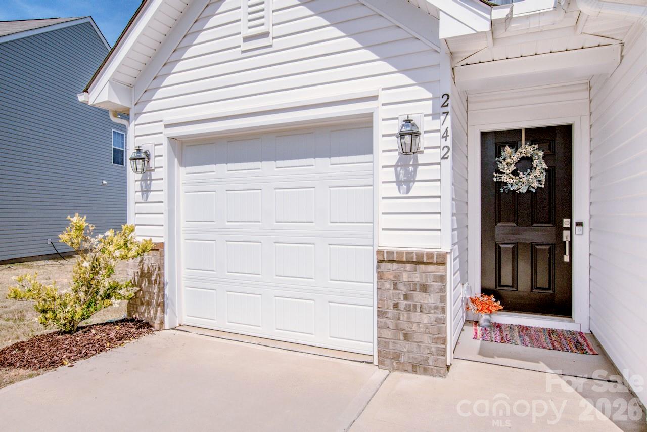 2742 Legacy Ridge Lane Catawba, NC 28609 - Photo 3 of 36 a front view of a house with a garage
