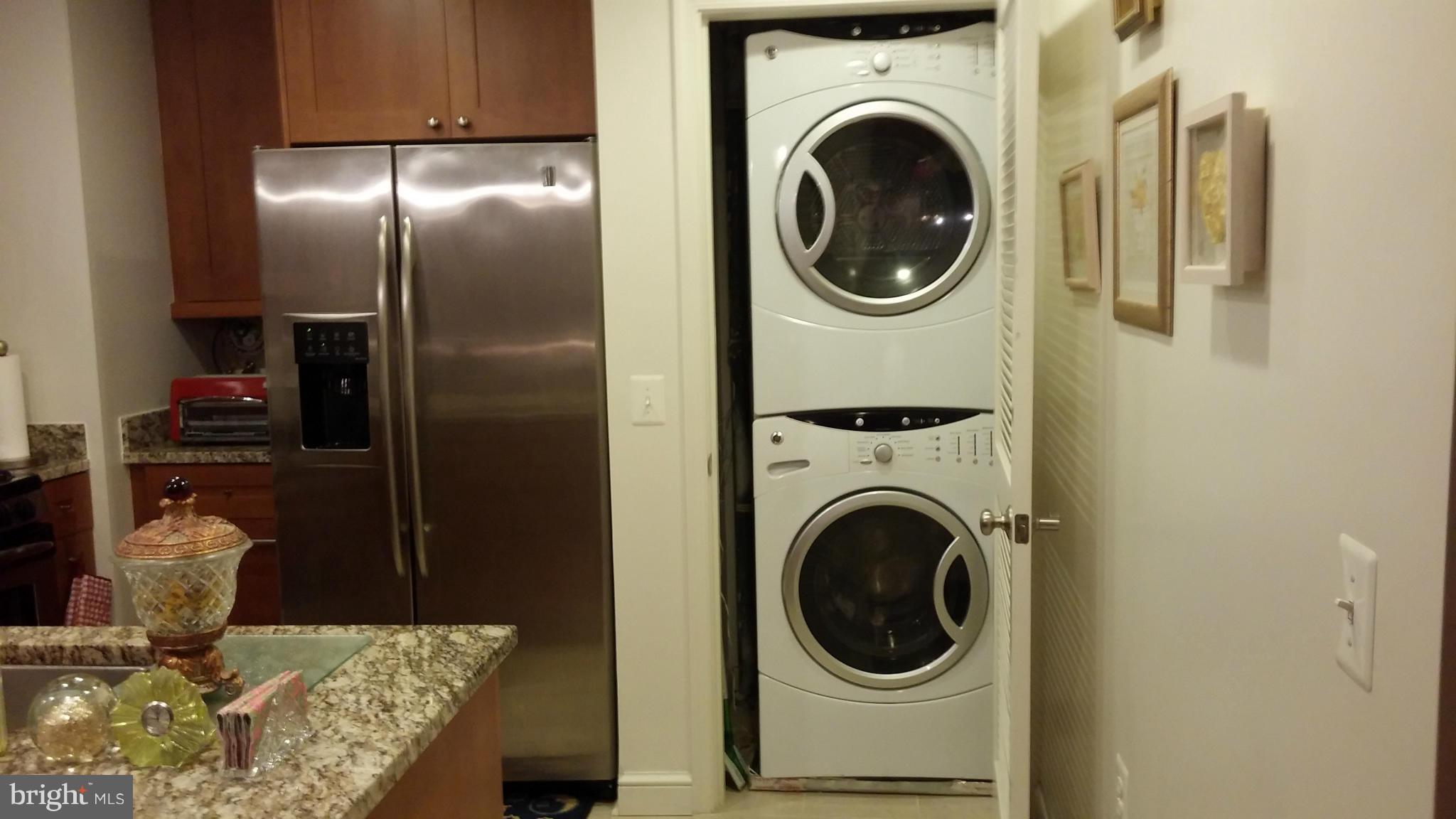 11990 Market Street, Unit 208 Reston, VA 20190 - Photo 16 of 30 full-size washer/dryer