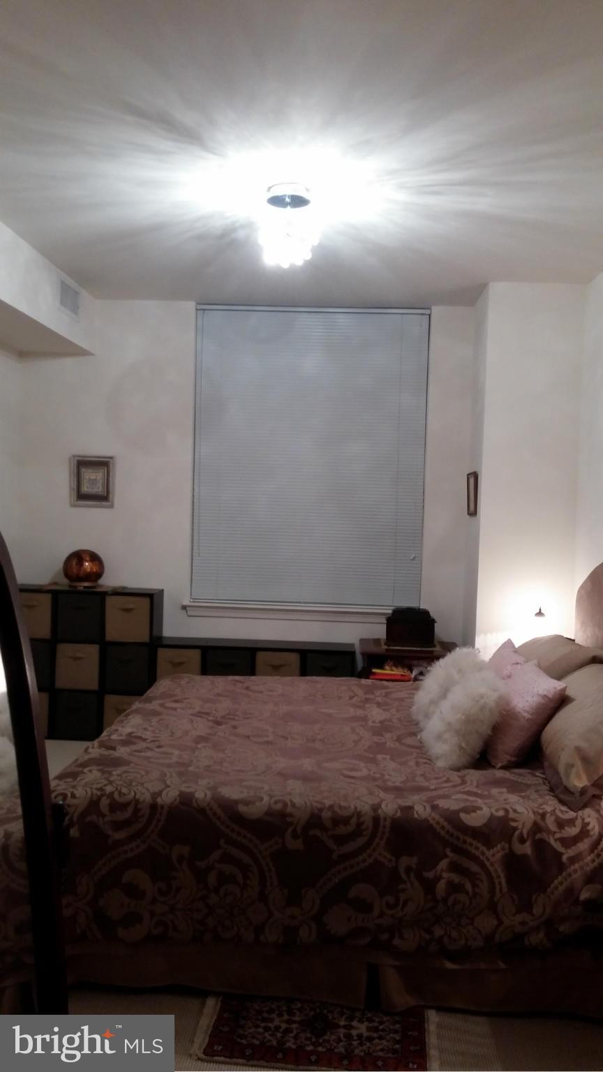 11990 Market Street, Unit 208 Reston, VA 20190 - Photo 8 of 30 Bedroom (Master) furniture conveys