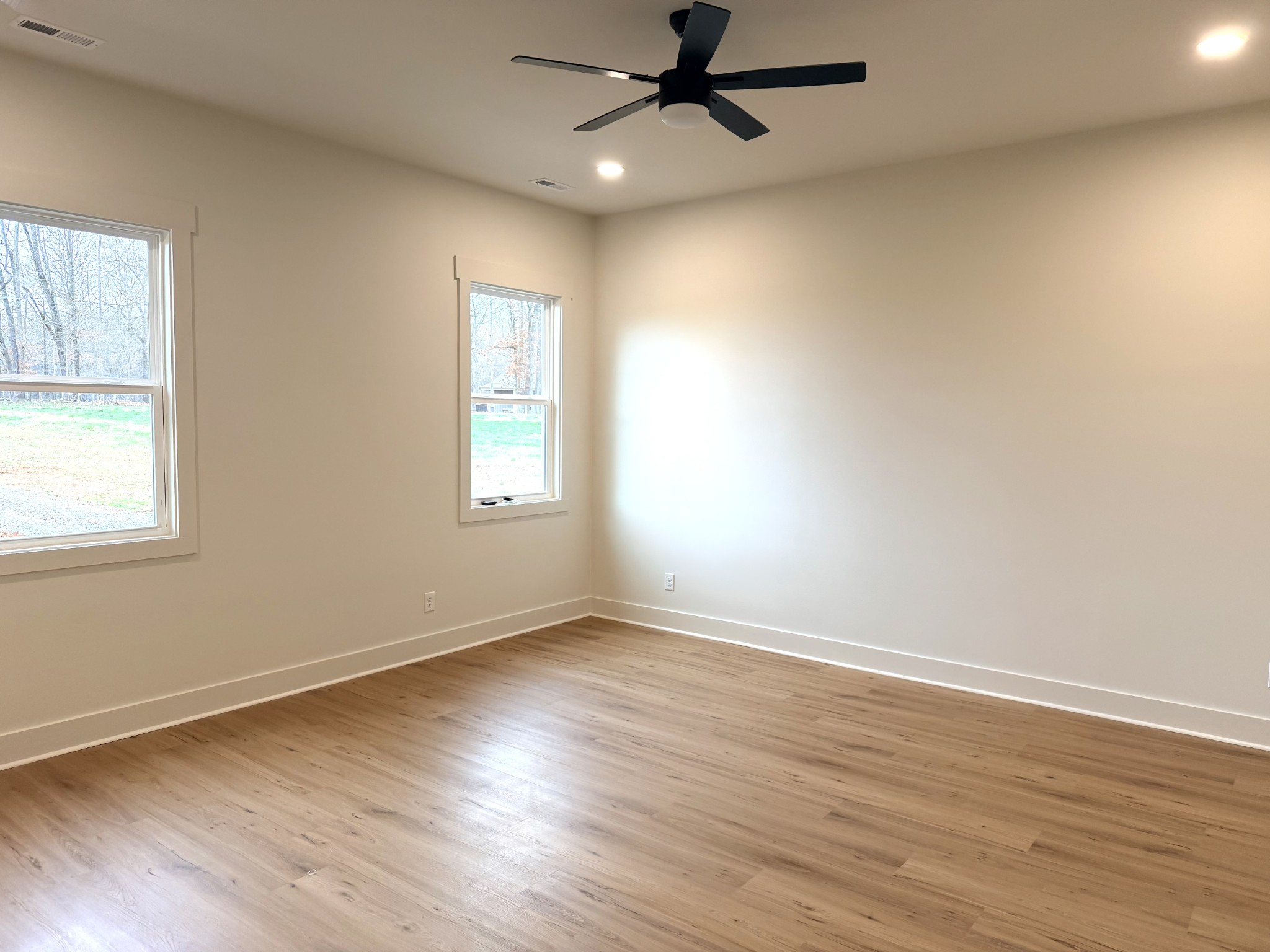 4031 Wells Road Springfield, TN 37172 - Photo 11 of 23 a view of an empty room with wooden floor and a window