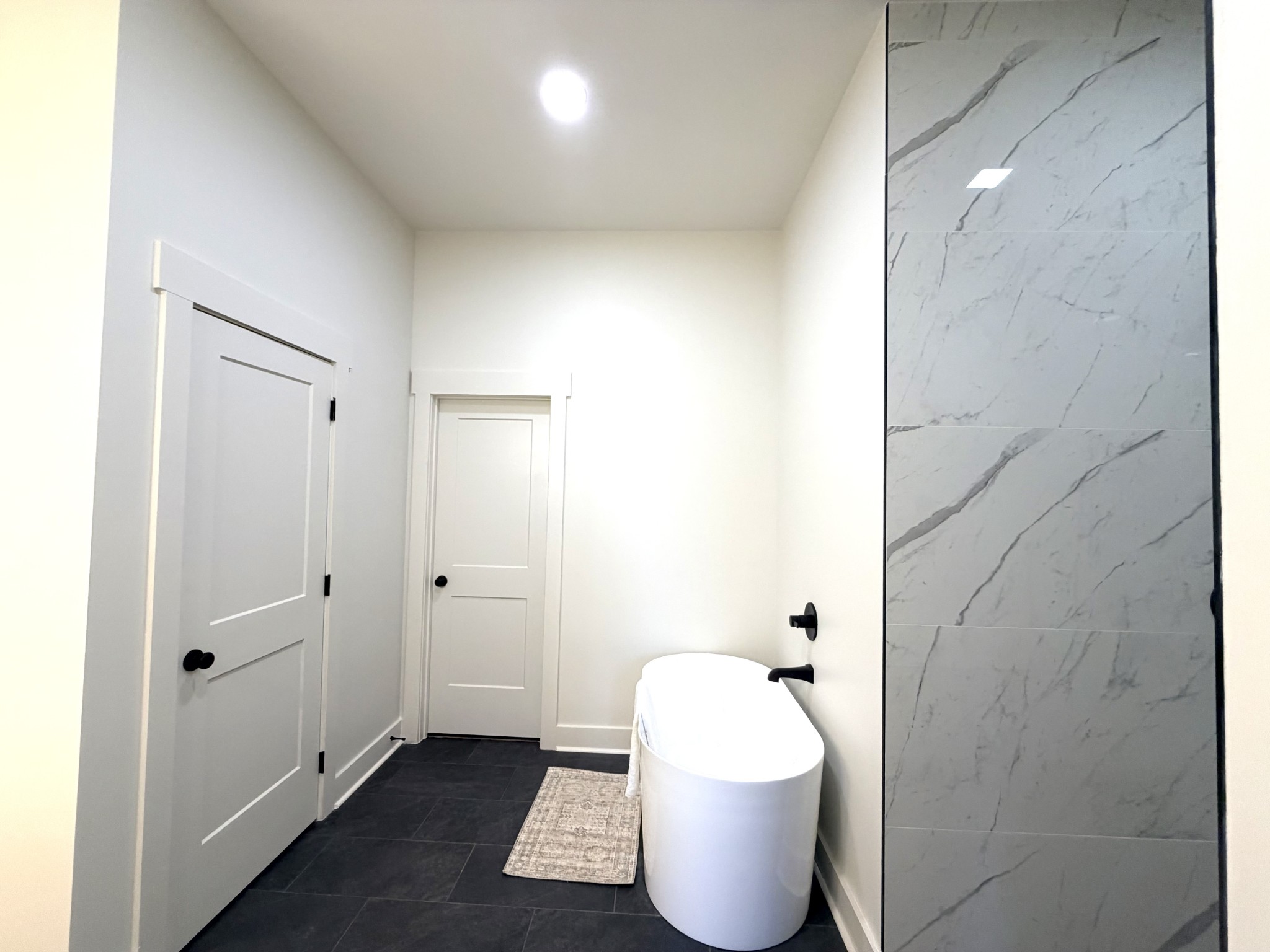 4031 Wells Road Springfield, TN 37172 - Photo 14 of 23 a bathroom with a bathtub and shower