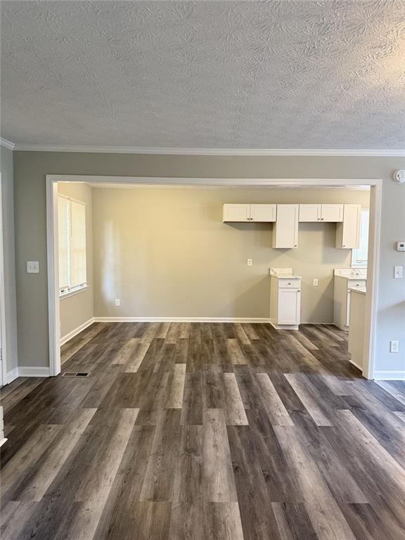 3990 Highway 92 Acworth, GA 30102 - Photo 16 of 26 a view of empty room with wooden floor and fan