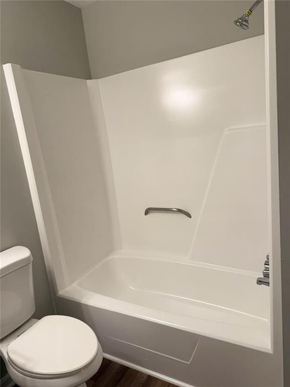 3990 Highway 92 Acworth, GA 30102 - Photo 19 of 26 a white toilet sitting next to a bath tub