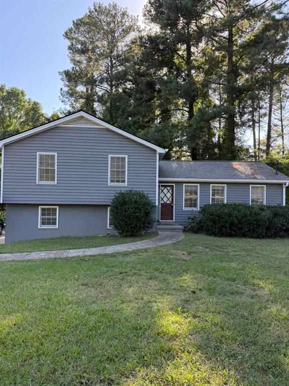 3990 Highway 92 Acworth, GA 30102 - Photo 2 of 26 a front view of a house with a garden
