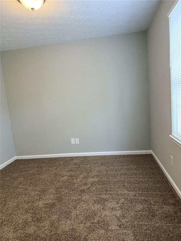 3990 Highway 92 Acworth, GA 30102 - Photo 22 of 26 a view of an empty room and window