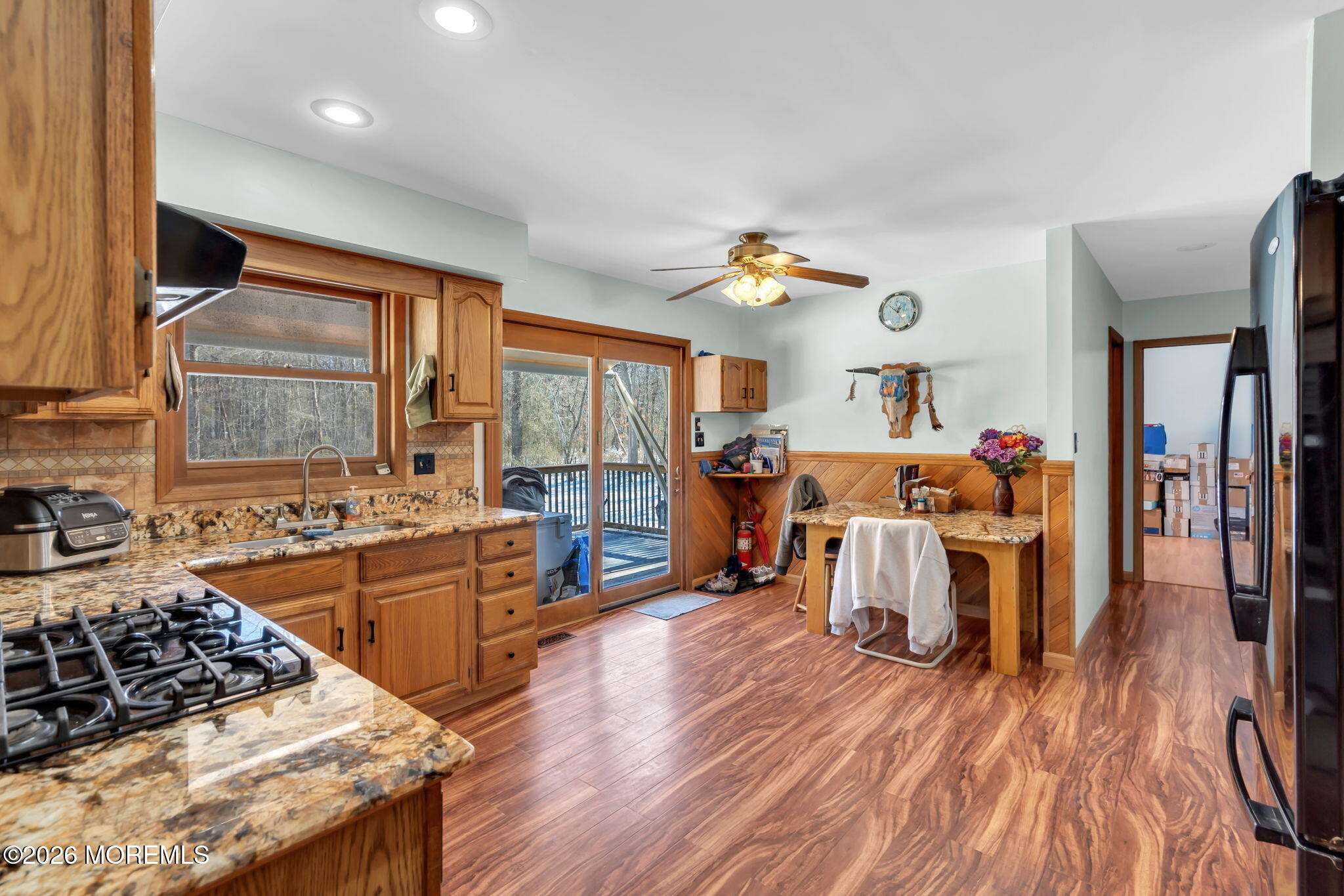 177 Cedar Swamp Road Jackson, NJ 08527 - Photo 4 of 27 a large kitchen with a table and chairs