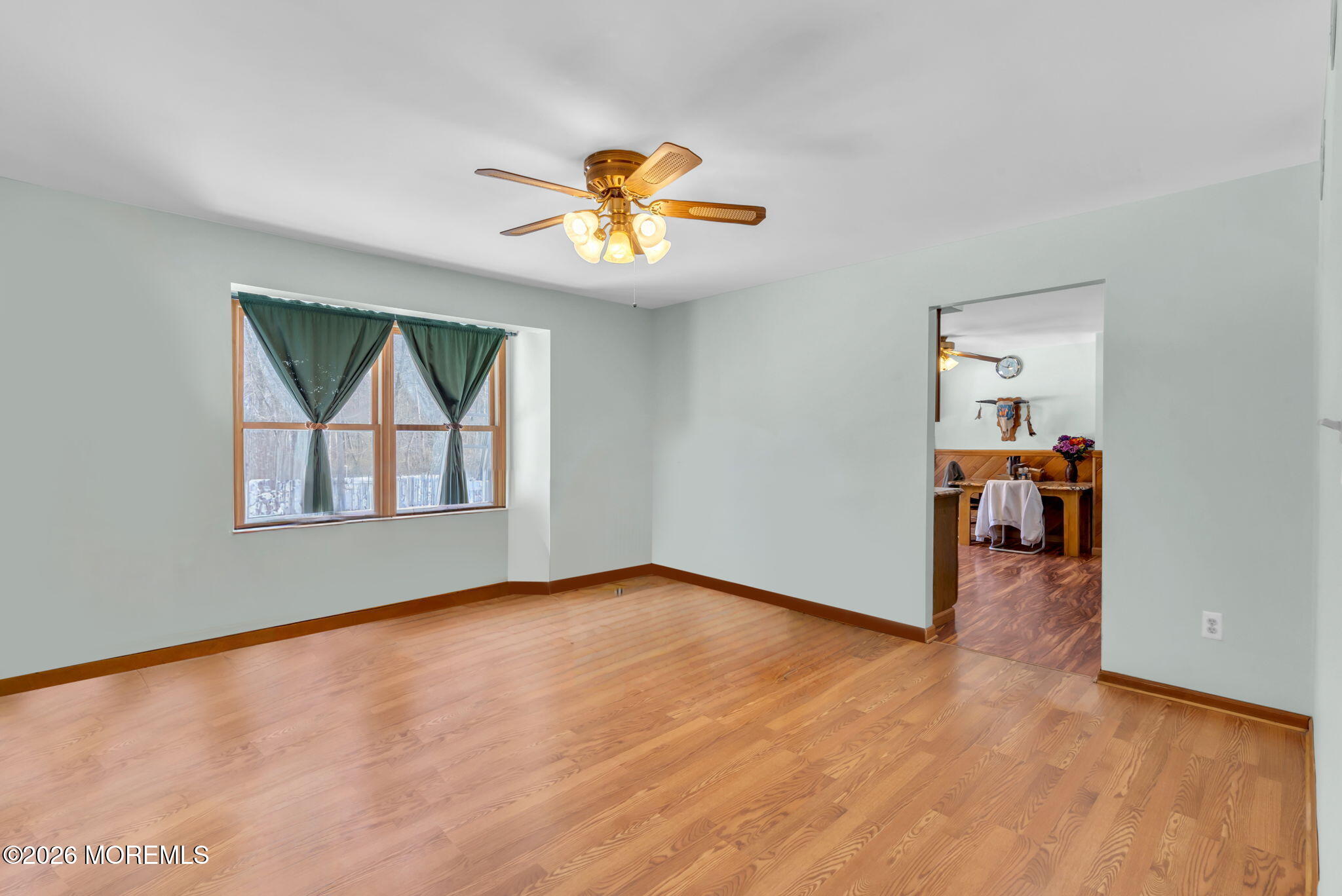 177 Cedar Swamp Road Jackson, NJ 08527 - Photo 10 of 27 a view of livingroom with hardwood floor and ceiling fan