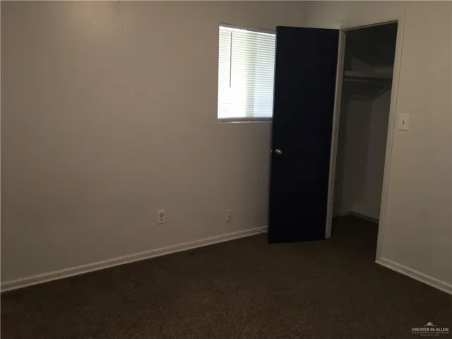 a view of a back yard of the house