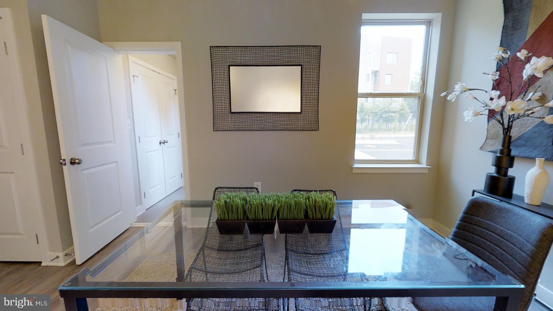 1262 Talbert Street Southeast, Unit B Washington, DC 20020 - Photo 12 of 18 a view of a livingroom with furniture and window