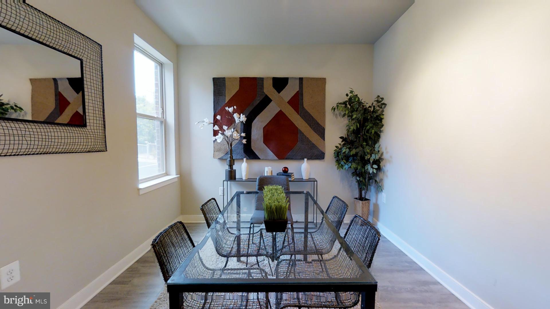 1262 Talbert Street Southeast, Unit B Washington, DC 20020 - Photo 10 of 18 a living room with furniture and wooden floor